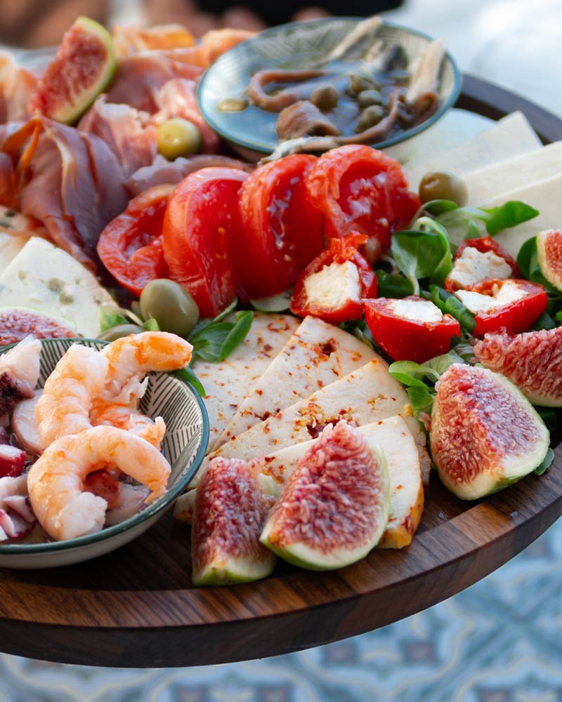 What's included on a Solamoré private event — crewed superyacht, dining, and onshore experiences