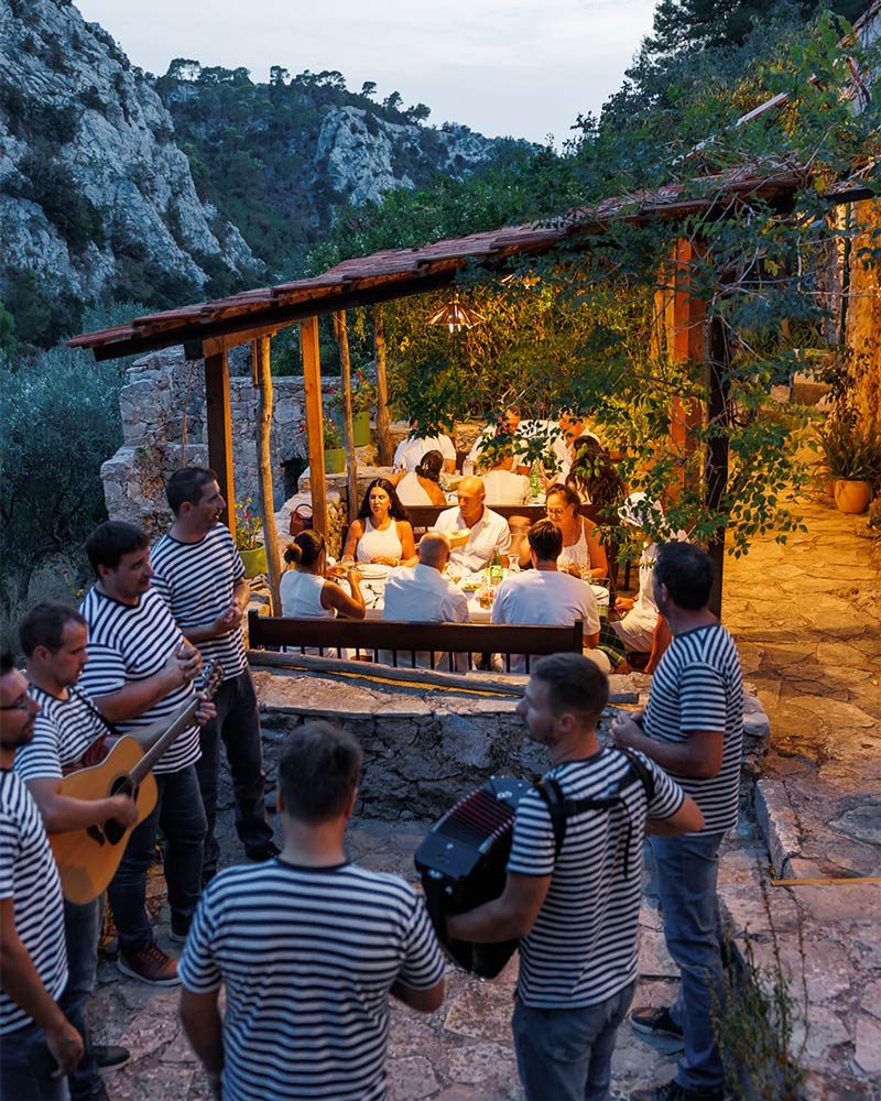 What's included on a Solamoré private event — crewed superyacht, dining, and onshore experiences